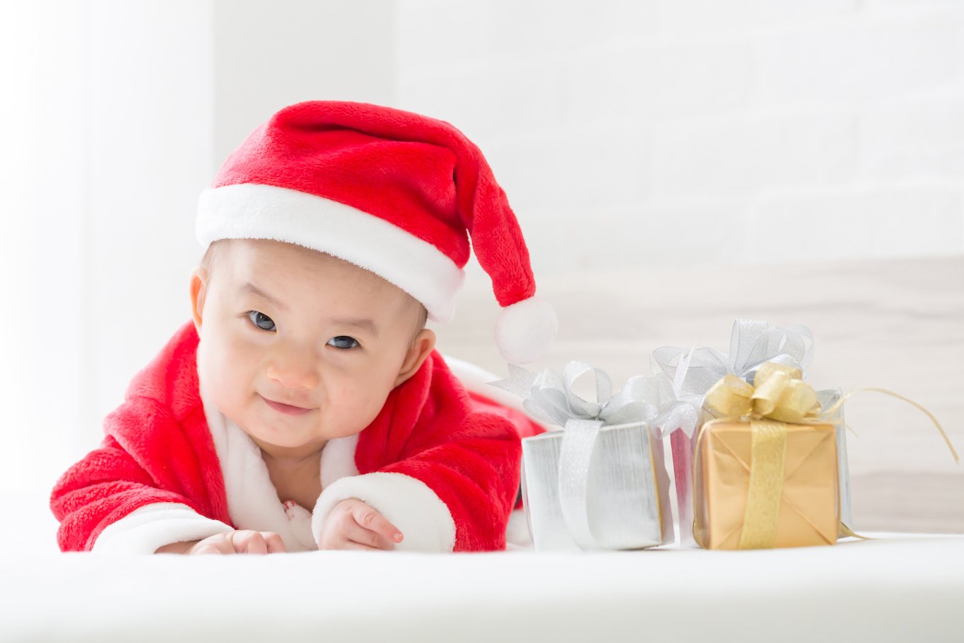 Baby wearing a santa costume