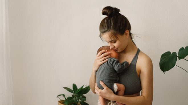 Woman holding newborn