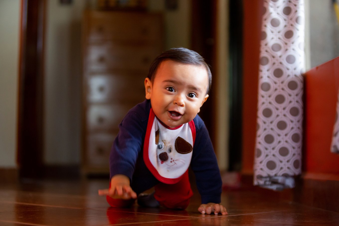 Baby crawling very happily
