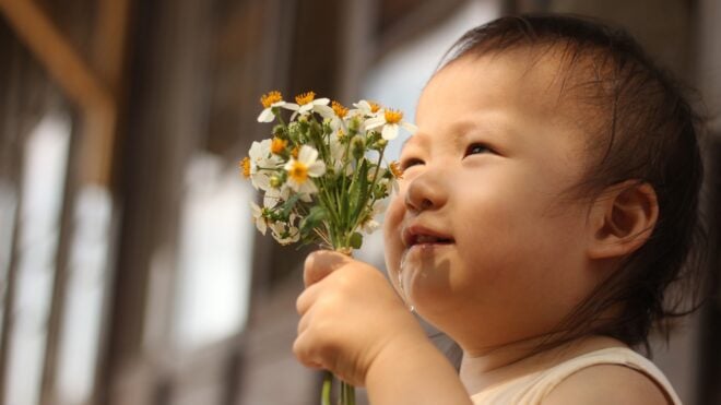 baby with flowers