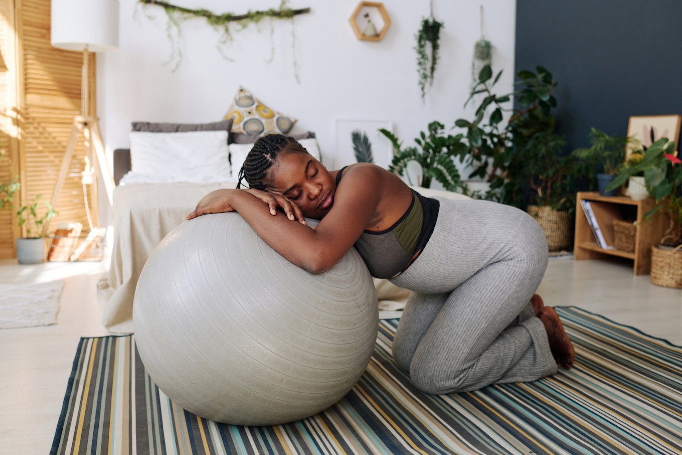 Pregnant at home with yoga ball