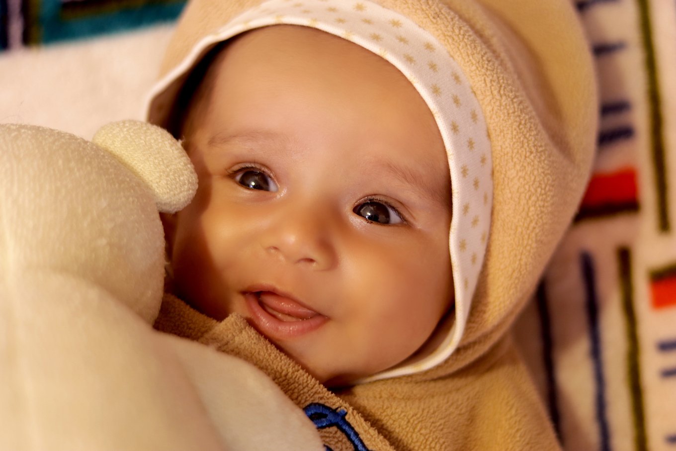 Baby girl with a teddy bear