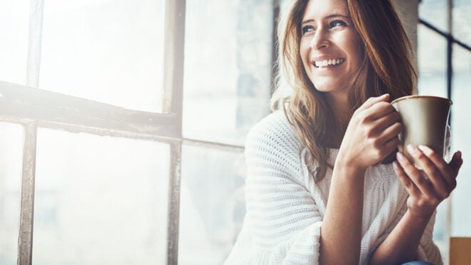 woman holding coffee
