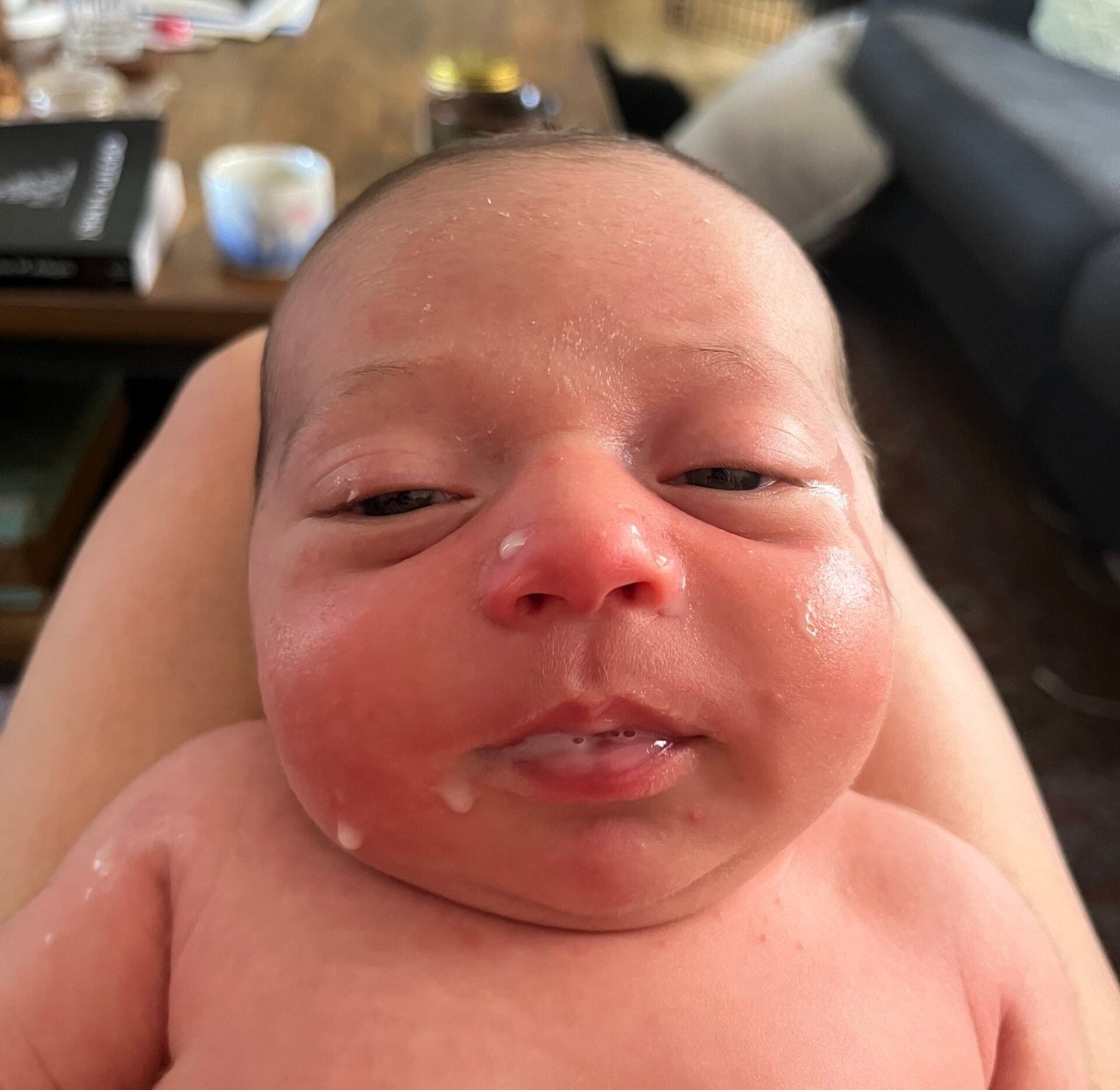 Marco with milk all over his face