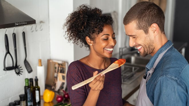 young couple in the kitchen - healthy eating for fertility
